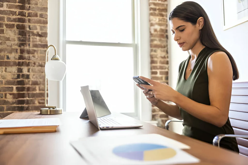 Businesswoman working at her desk in modern office
