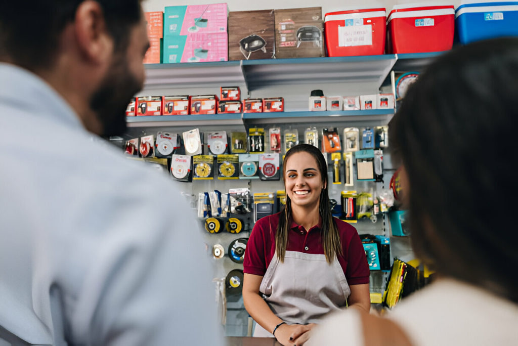 Saleswoman talking to customers in a building material store
